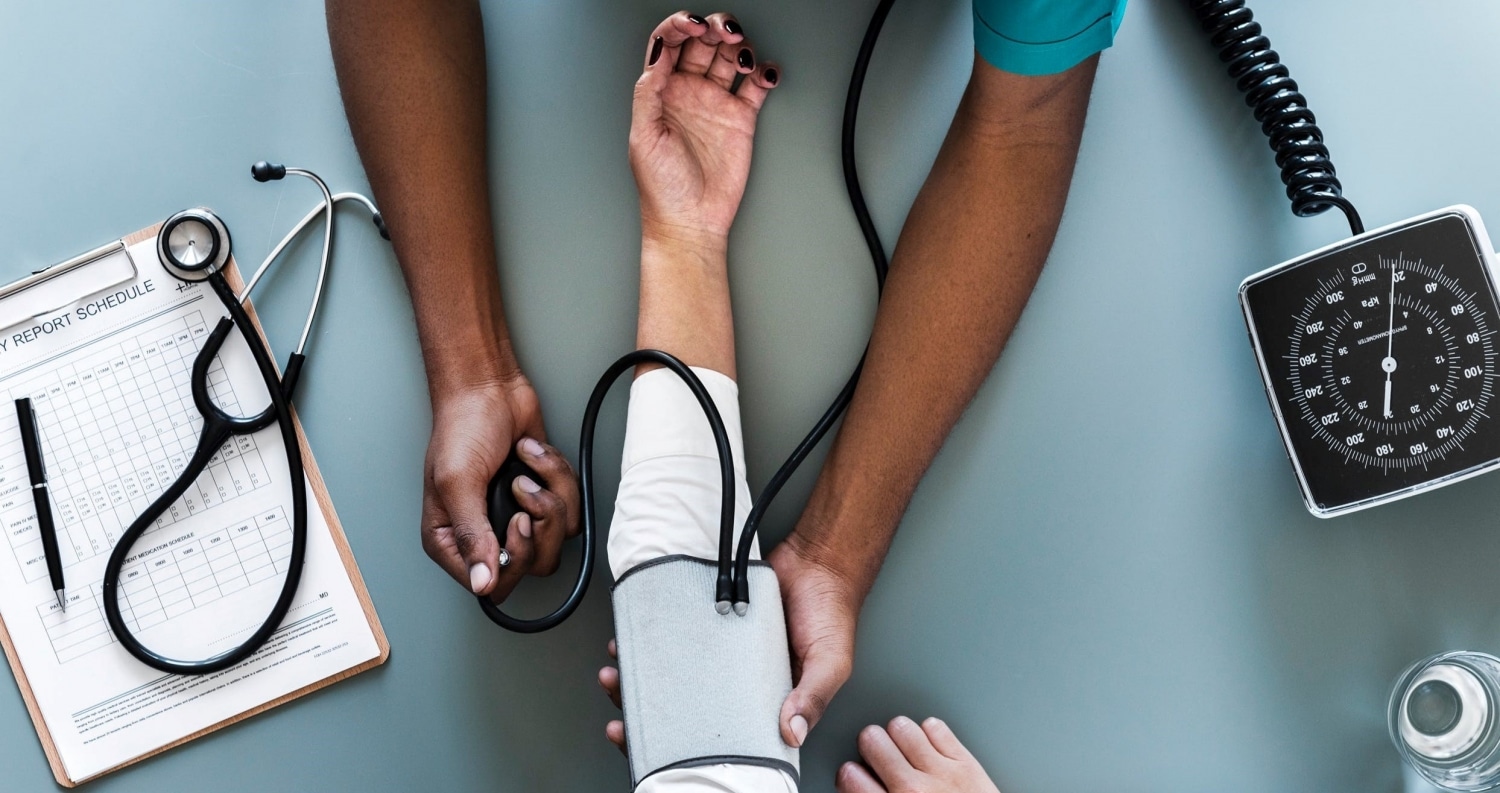 Up close view of nurse checking vitals