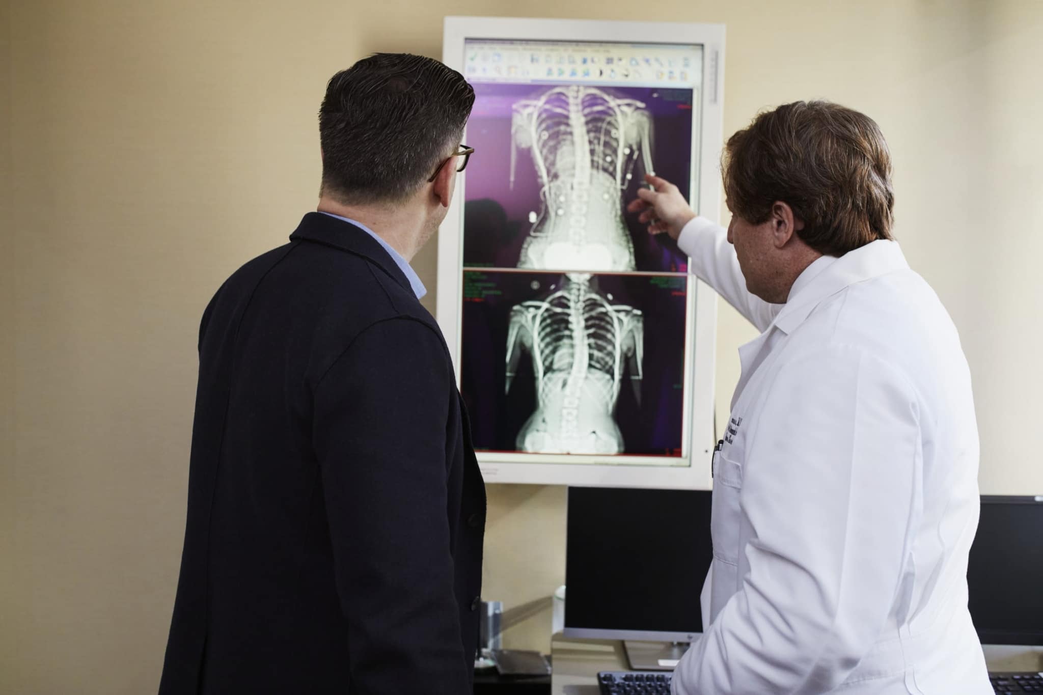 Professionals looking at X-rays