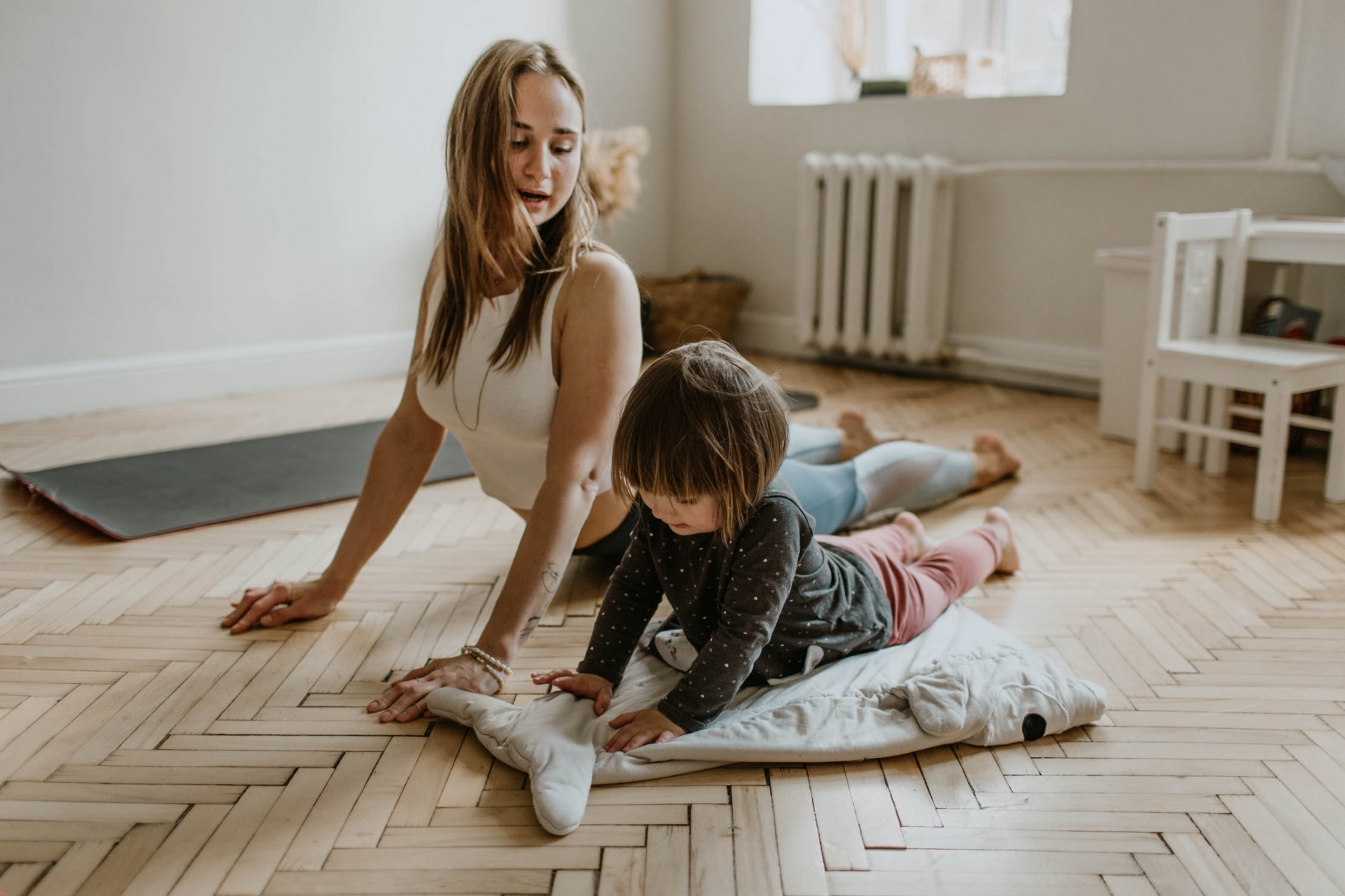 Mother and daughter stretching