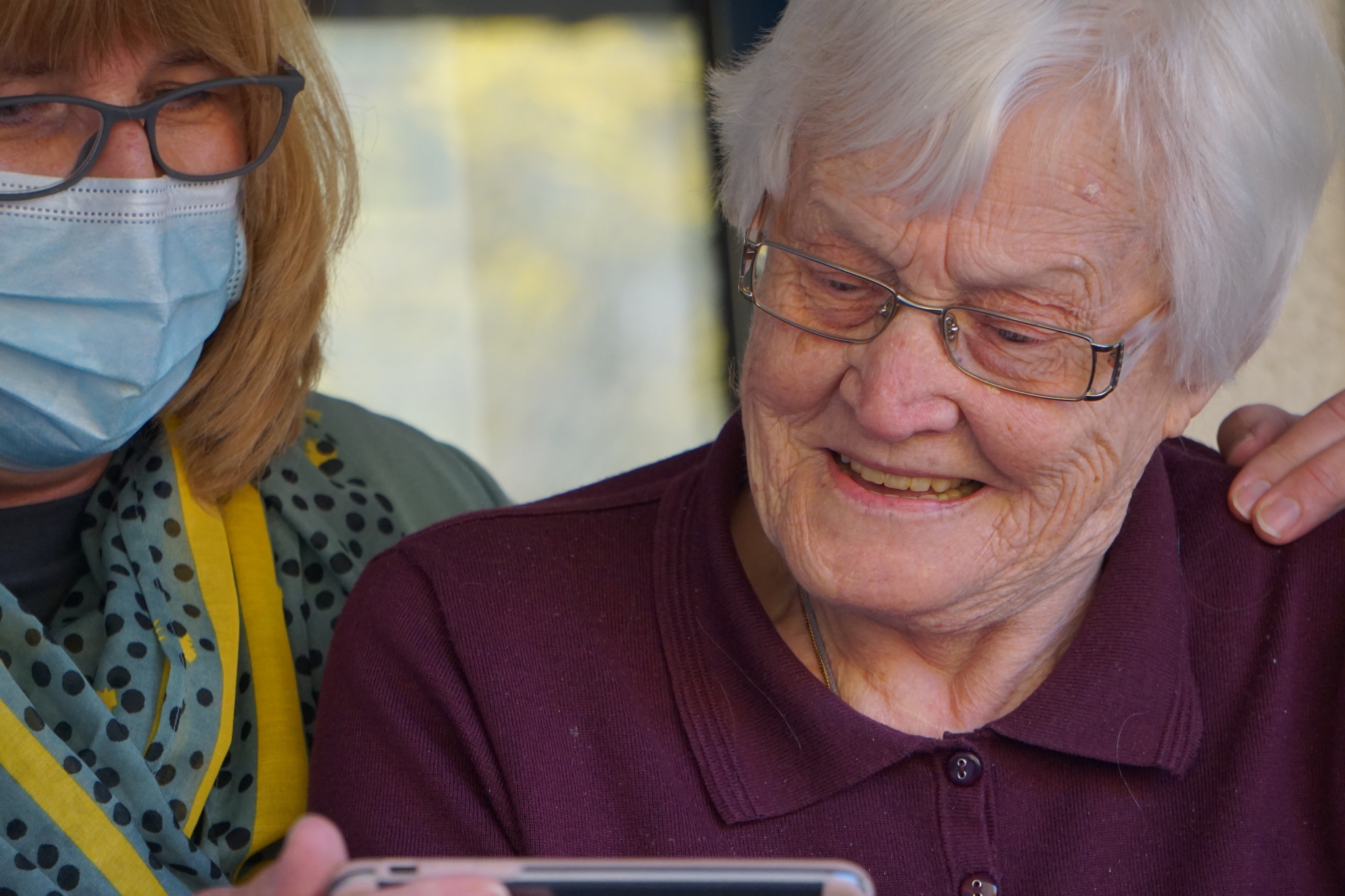 Nurse caring for an elderly patient