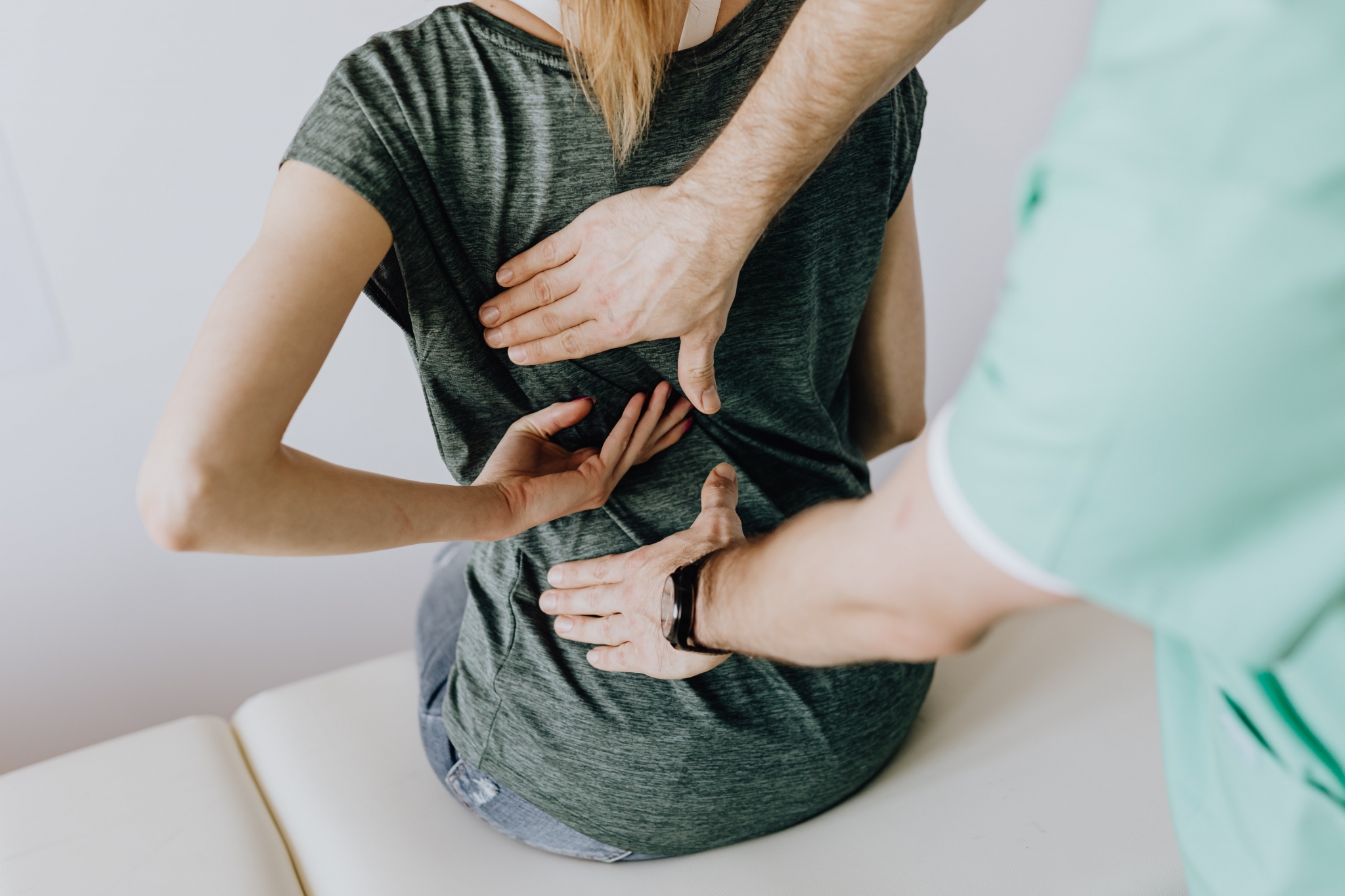 Medical professional examining a patient