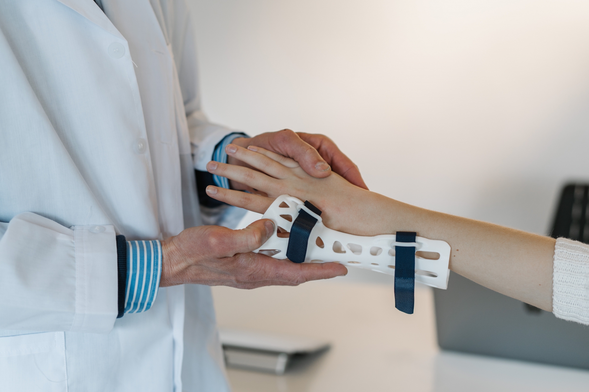 Medical professional applying a splint
