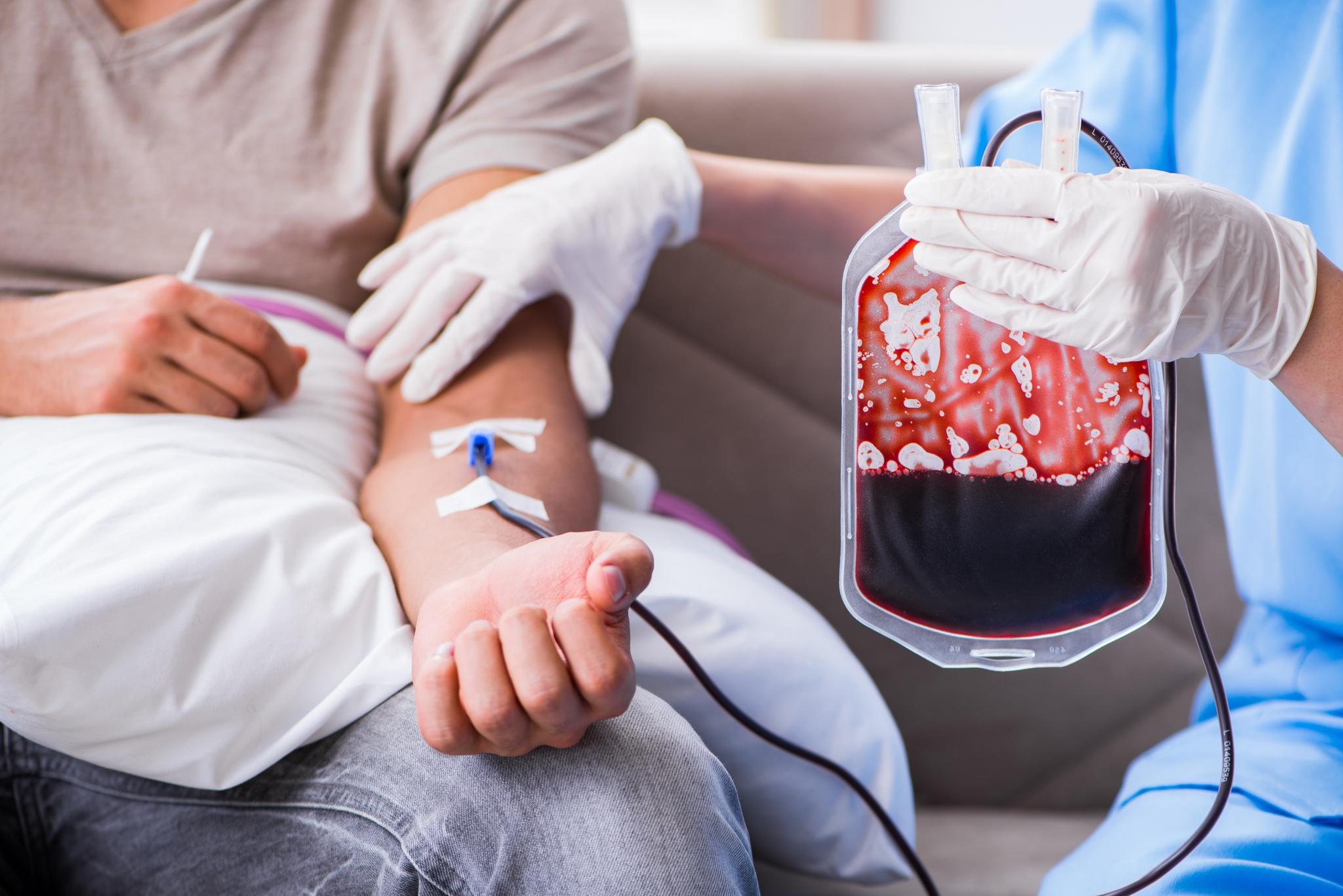 Nurse administering a blood transfusion Nurse administering a blood transfusion.