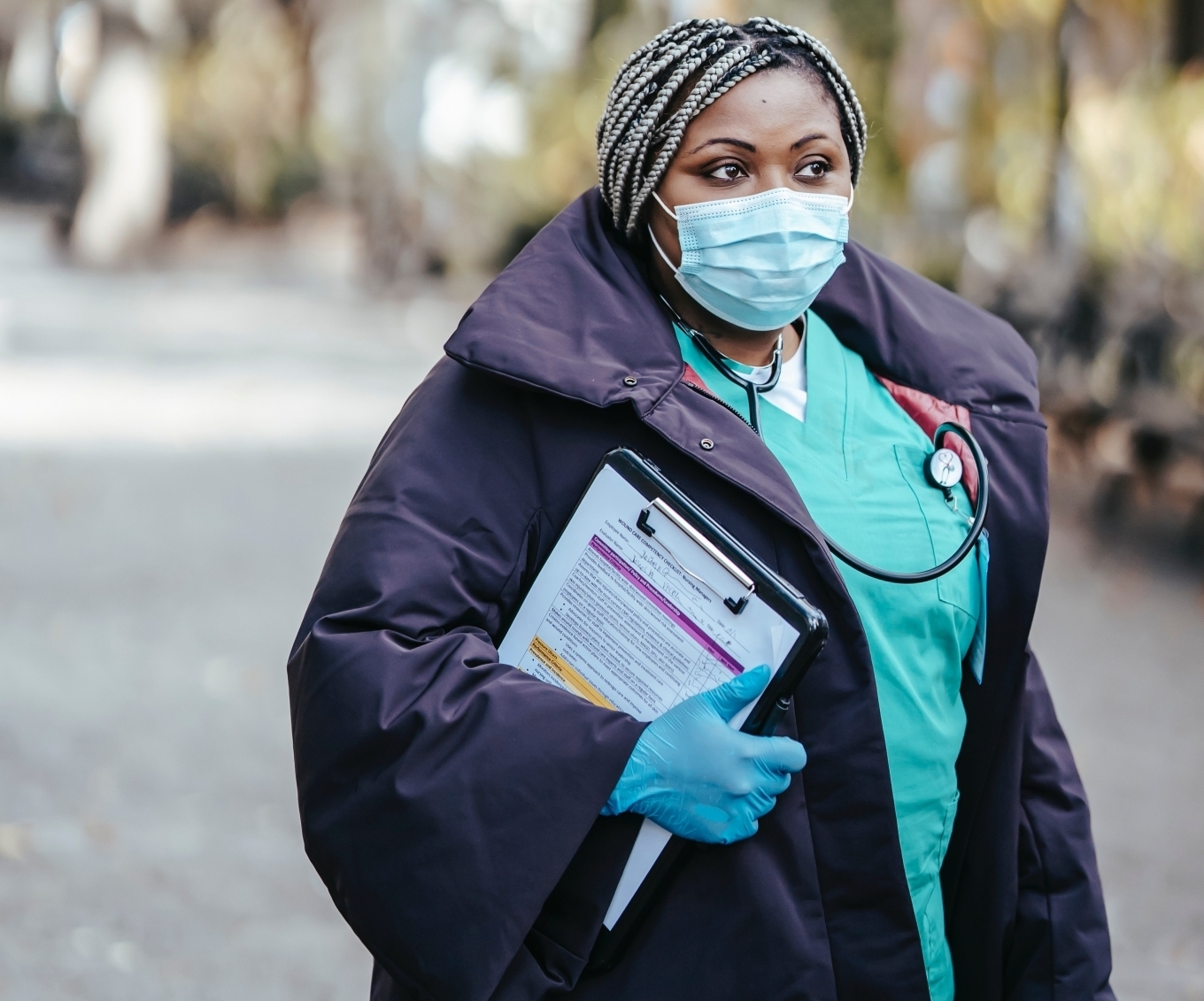 African-American nurse with a clipboard