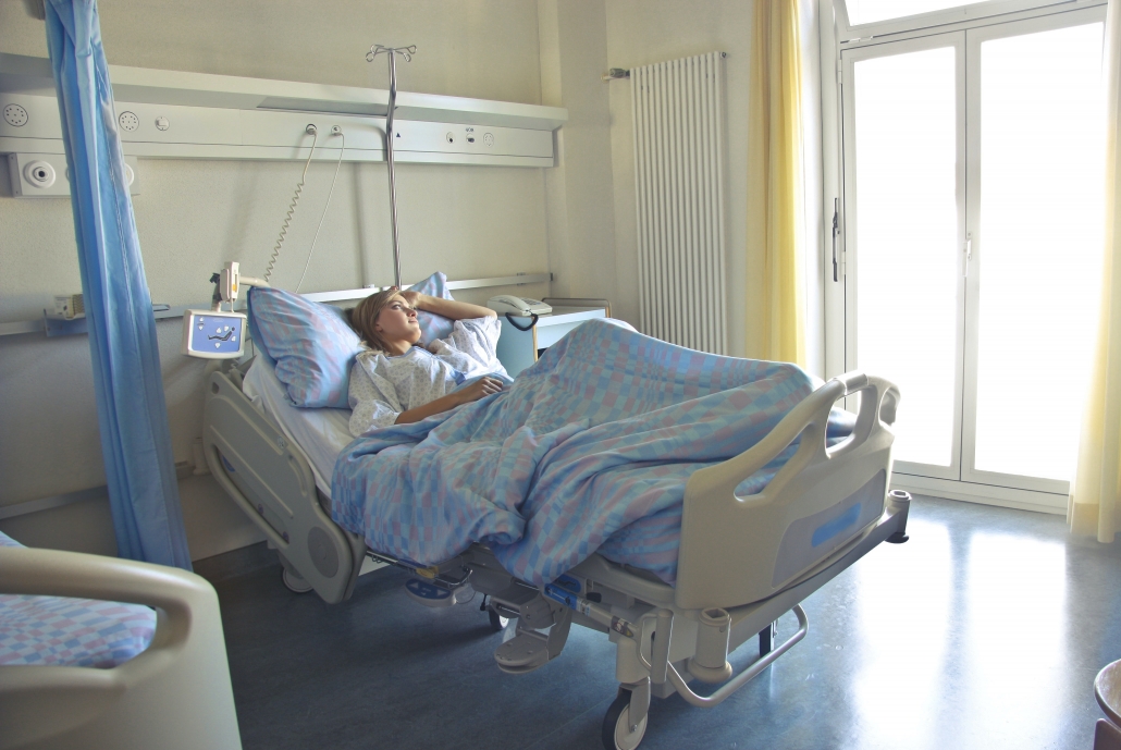 Female patient in a hospital bed