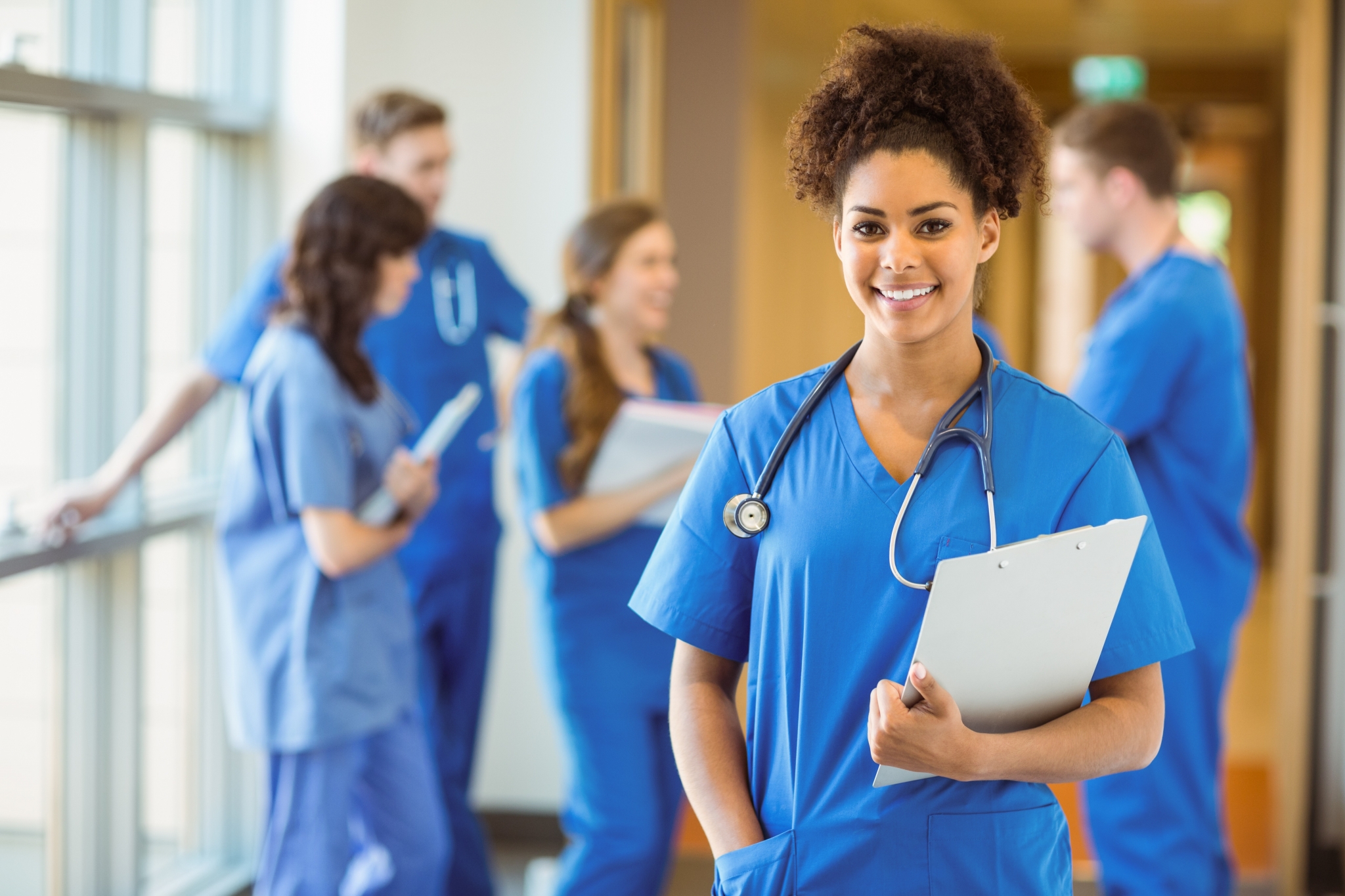 Medical students in a hallway