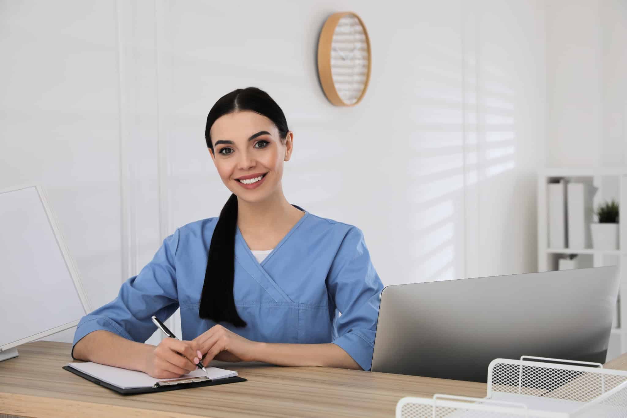 Medical Office Assistant with clipboard