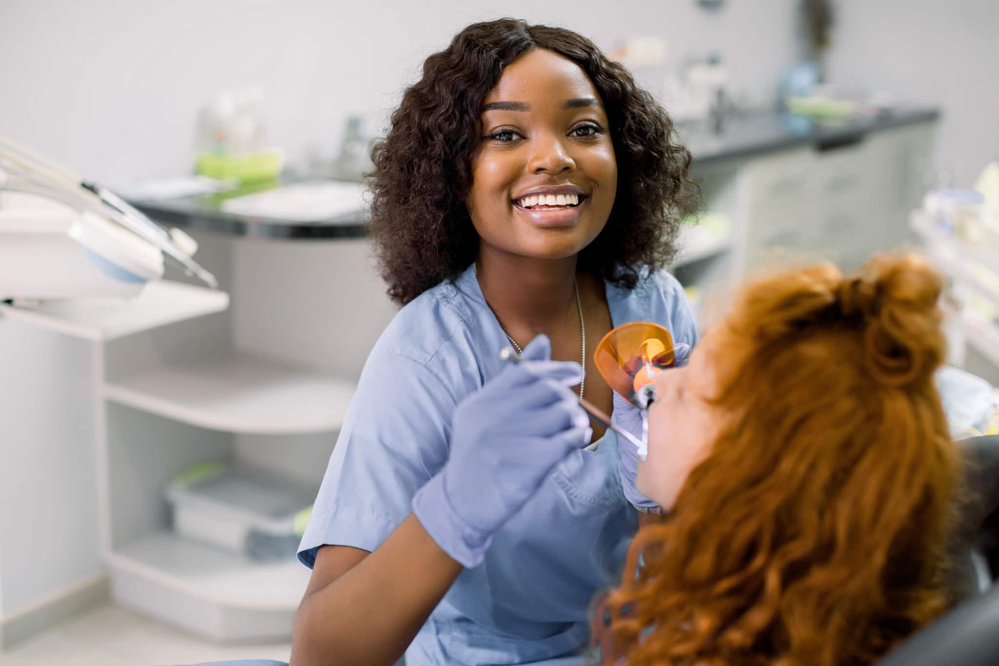 Smiling African-American dental professional