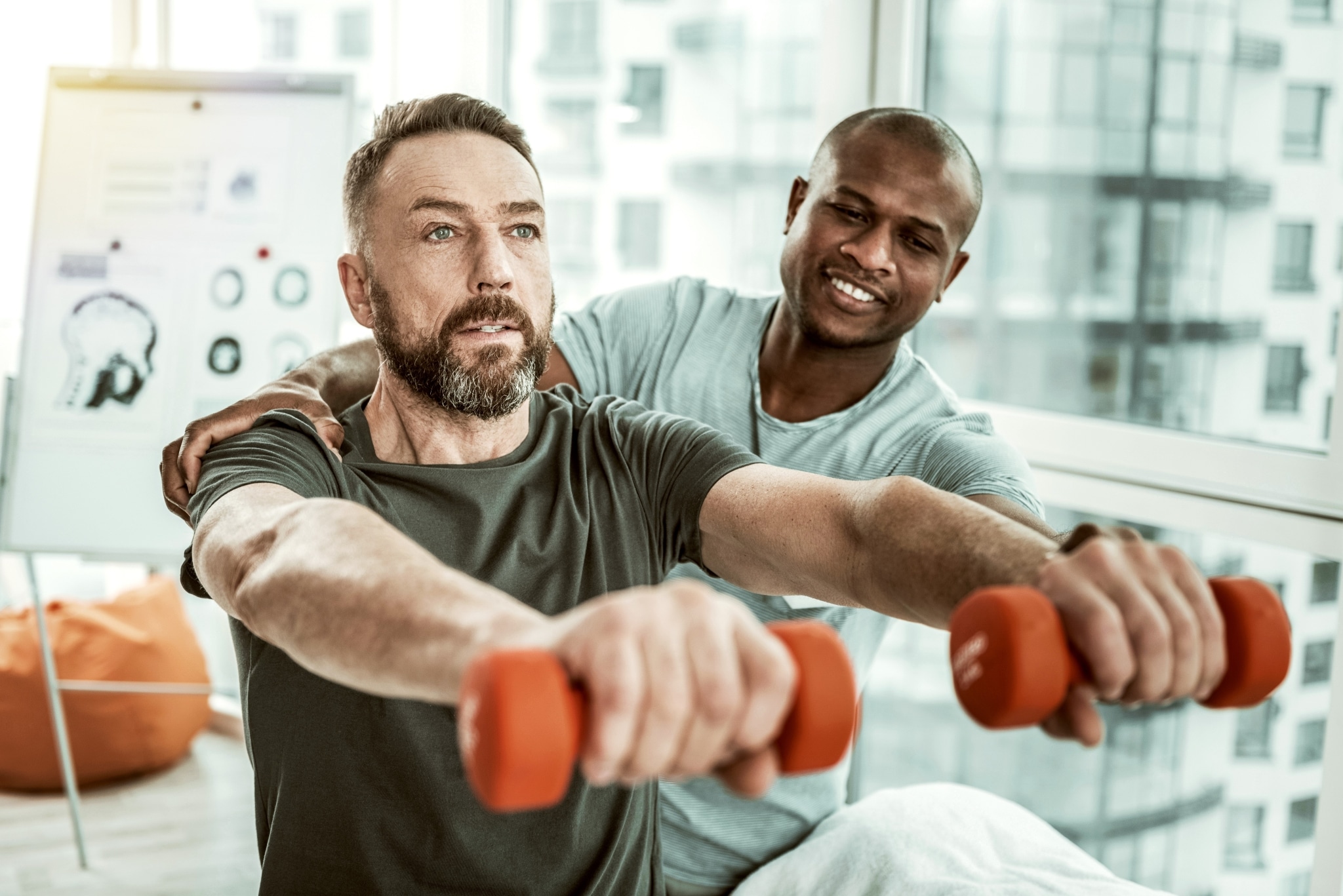 Physical Therapist Assistant helping a patient