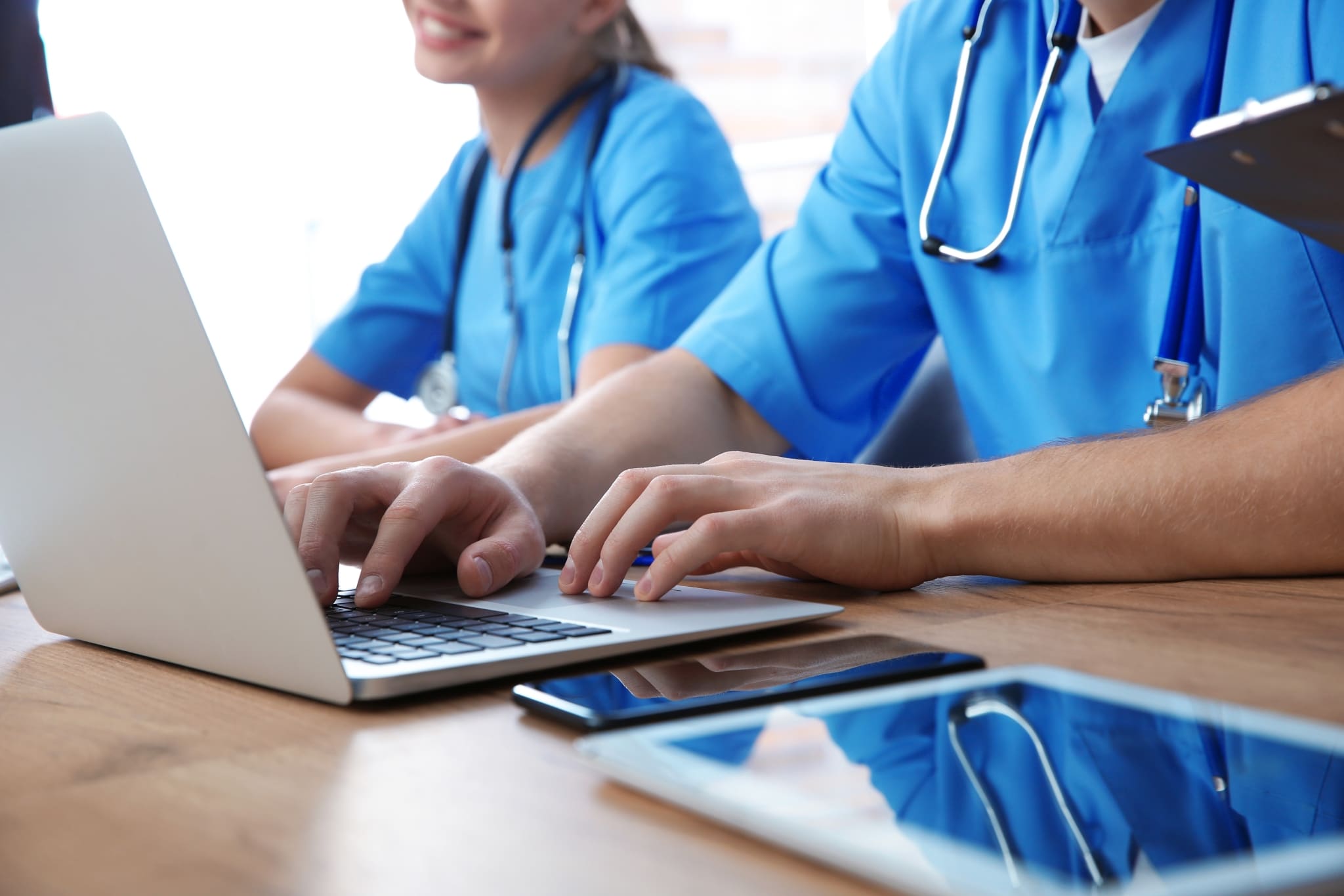 Medical students studying at a table