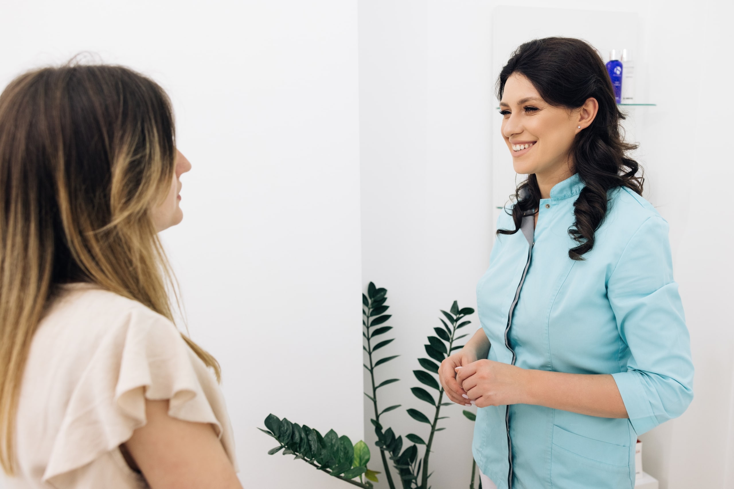 Client and physiotherapy worker in rehabilitation center