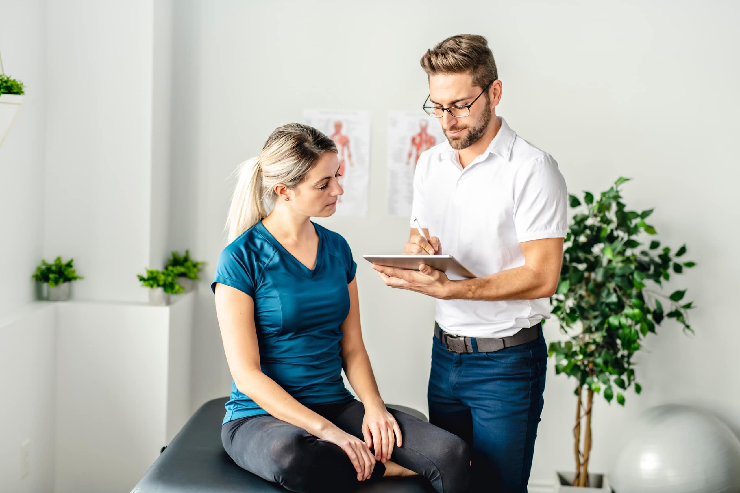Modern rehabilitation clinic with a man and patient