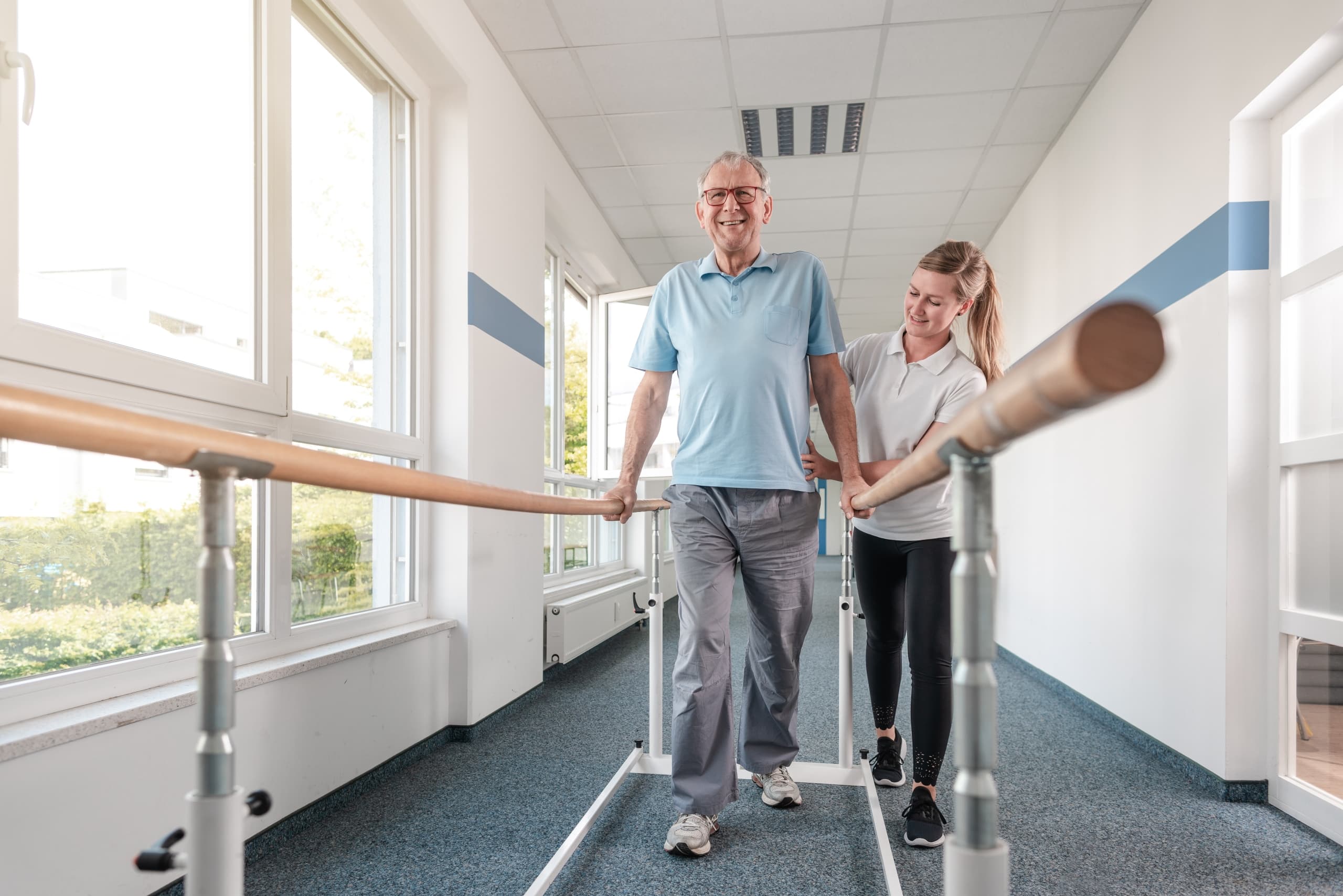 Senior patient in rehabilitation performing exercises