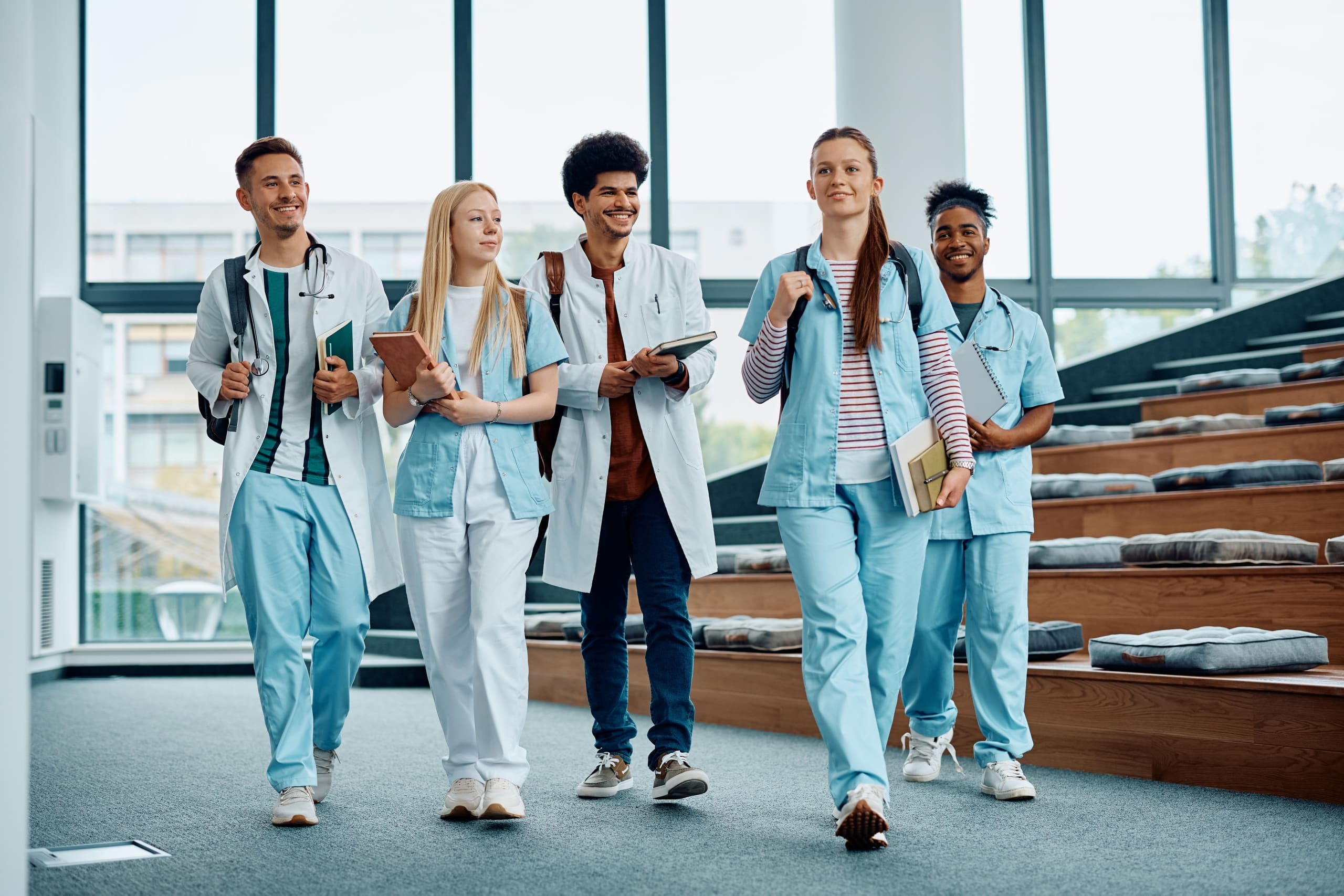 Group of medical students walking in a lecture room